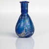 Foto Mostra Little Bigl Things_Capolavori dalla Collezione Storp_Bottiglia portaprofumo con corpo globiforme in vetro azzurro 1.-2. d.C.